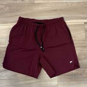 Fabletics Men's aThe One Lined Maroon Athletic Shorts With Black Liner 7 inch